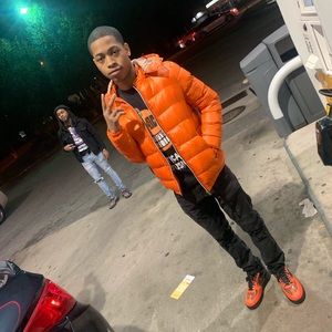 Small orange puffer jacket